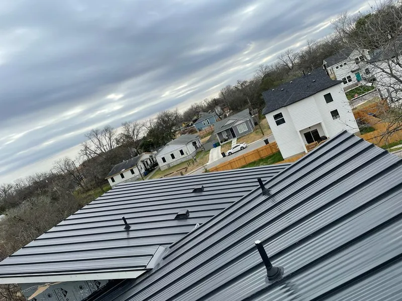 Standing seam metal roof panels with vents for Skylight Repair in Fairport